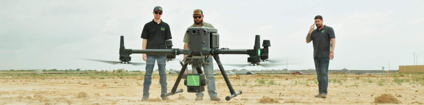 Civil Mesh crew flying a survey-grade drone on a Texas jobsite